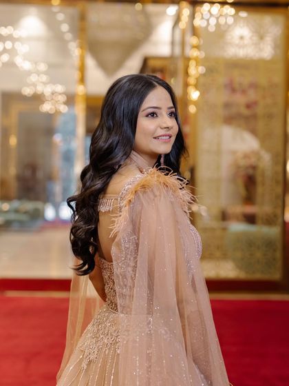 A candid moment of the Roka bride. The makeup is designed to look beautiful from all angles, whether posed or in a natural, happy moment.