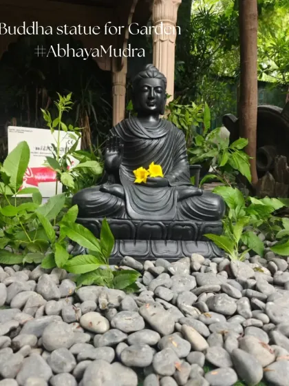 This image highlights the calming presence of the Buddha statue in a garden setting, a feature we often include to create a tranquil and meditative space.