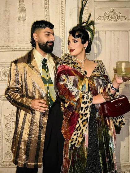 Another shot from the GQ Best dressed event, showcasing the complete vintage hair and makeup look. The sculpted waves and elegant styling were a key part of this memorable red carpet appearance.