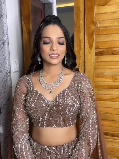 A close-up of the eye makeup for the sangeet, featuring a soft brown smoky eye that enhances her beautiful eyes.
