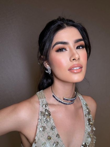 A close-up that focuses on the glossy lip and the flawless skin. This is my signature for creating a look that is polished and camera-ready.