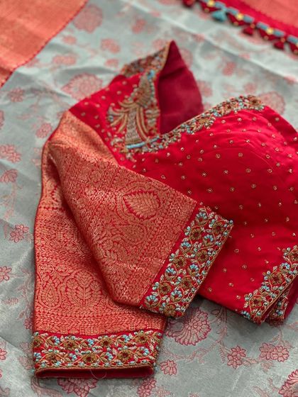 A close-up of the brocade sleeve and embroidery.