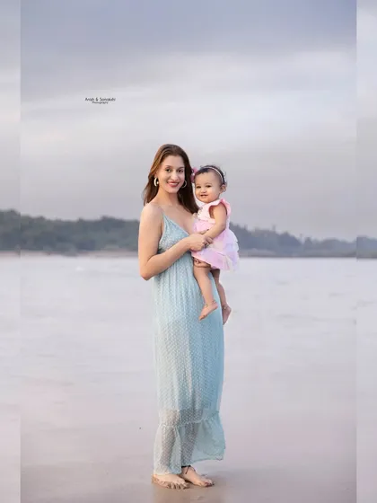 These two have our hearts. A beautiful mother and daughter enjoying a moment together during a beach photoshoot.