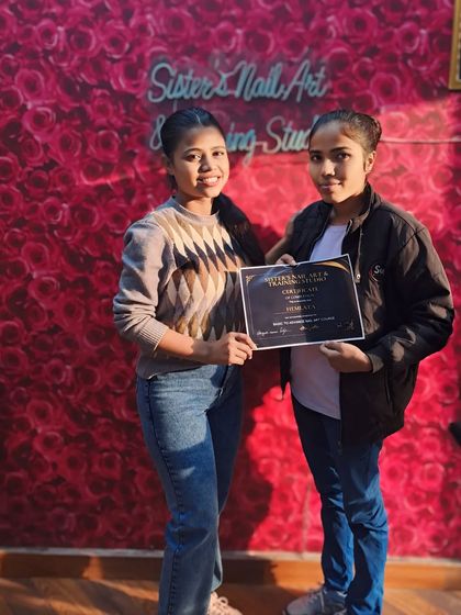 Hemlata is all smiles after successfully finishing her nail art course. We wish her all the luck for her future as a nail technician.
