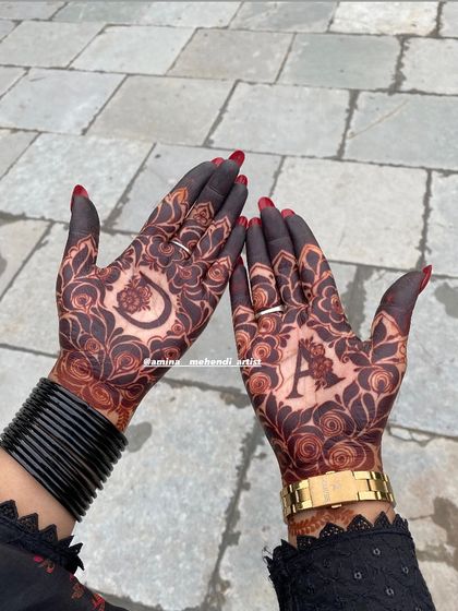 The deep, rich stain makes the personalized initials and surrounding rose patterns stand out beautifully.