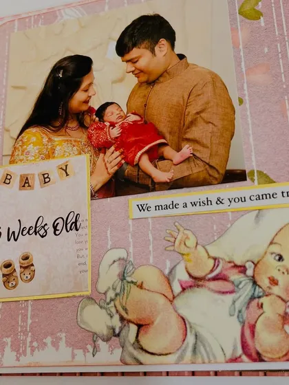 The '3 weeks old' page, capturing the very first moments of the family with their newborn.