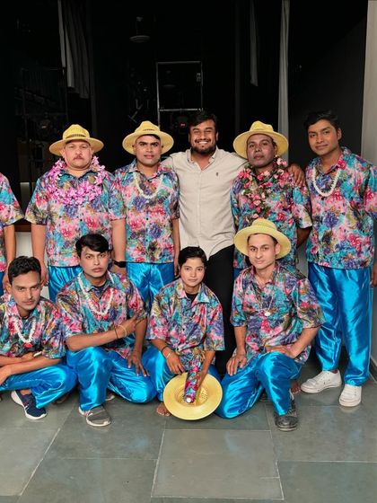 My team of dancers in vibrant, tropical-themed costumes for a corporate show. We can execute any creative theme to make your event unique and memorable.