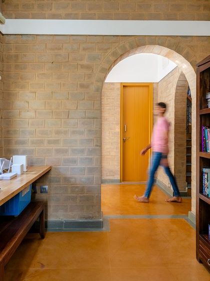 Another view of the study, showing the bookshelf and the flow of the space.