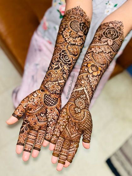 A full view of a stunning engagement design, featuring a mix of florals, paisleys, and a heart motif.