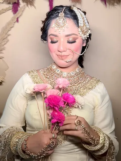 A close-up of the Nikkah bride look, with eyes closed to showcase the soft, shimmery eyeshadow.
