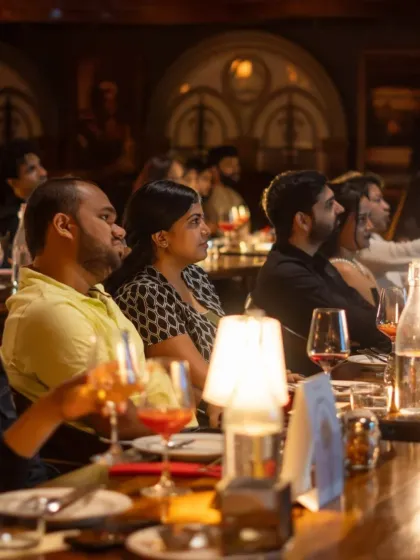 Guests completely absorbed in the film during our Eat Pray Love screening at Hamilton Cocktail Bar in Bangalore. The warm, ambient lighting and table-side service allow you to relax and get lost in the story unfolding on screen.