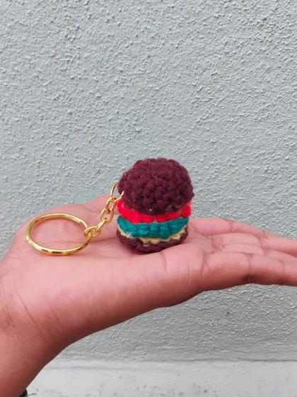 A tiny, calorie-free burger keychain. This is a great example of the fun, food-themed custom charms I can create for you.