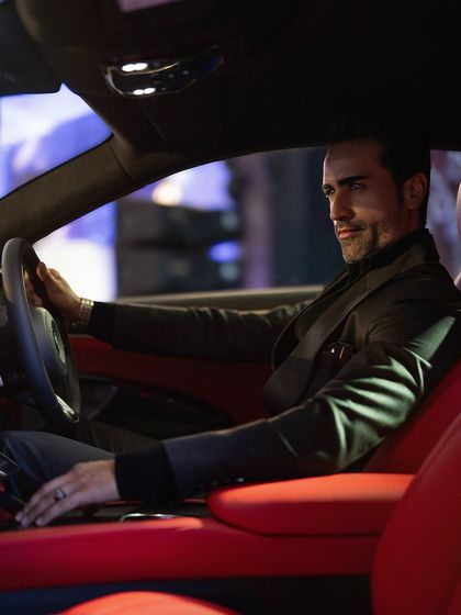 The epitome of luxury. Our tailored suits are designed to make you feel confident, whether you're at an event or behind the wheel.