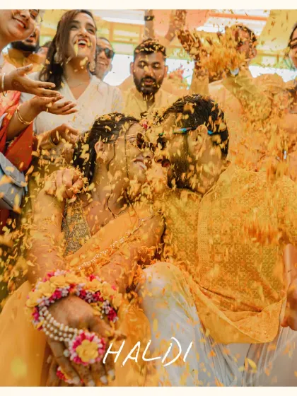 The Haldi ceremony is a beautiful chaos of color and joy. I focus on capturing the unscripted laughter and stolen glances amidst the shower of marigold petals.