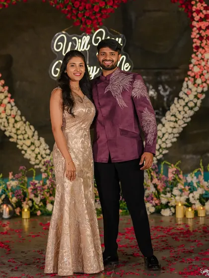 This look is perfect for a modern engagement or pre-wedding event. I created this custom deep purple bandhgala jacket with striking silver embroidery on the shoulder and sleeve, offering a contemporary yet regal style.