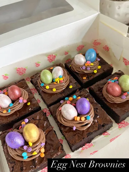 My egg nest brownies are a bestseller every Easter. I top rich, fudgy brownies with a swirl of chocolate buttercream, colorful sprinkles, and shimmering mini chocolate eggs.
