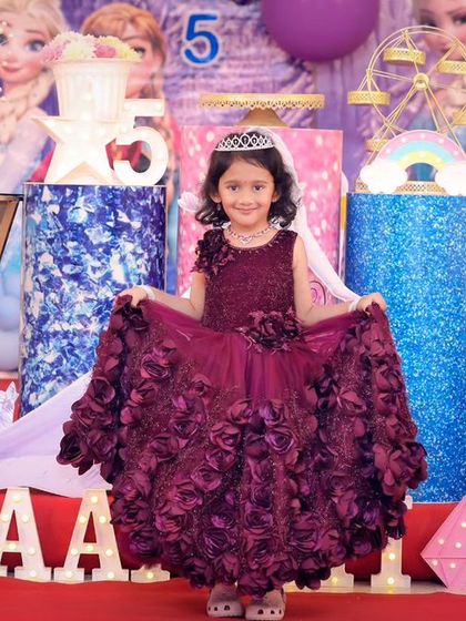 A charming 'Farm' themed birthday party, with rustic decor, animal cutouts, and hay bale props, perfect for a country-style celebration.