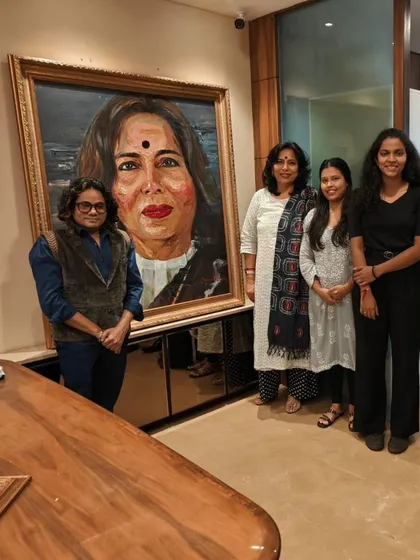 With the artist and my team at the unveiling of my portrait in our office. I am surrounded by talented and dedicated people who are an integral part of my journey.