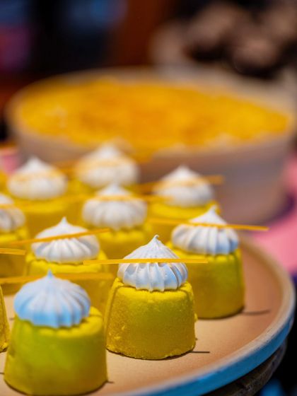 Our Summer Cooler Brunch features desserts that are as refreshing as they are beautiful. These mini mango mousse cakes are a perfect example, offering a light and fruity end to your poolside meal.