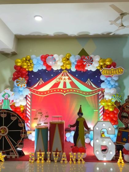 Another angle of the fun carnival theme, highlighting the Ferris wheel and colorful balloon arrangements.