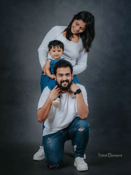 Love, laughter, and a fun family pose. We guide you into positions that feel natural and result in beautiful, connected family photographs.