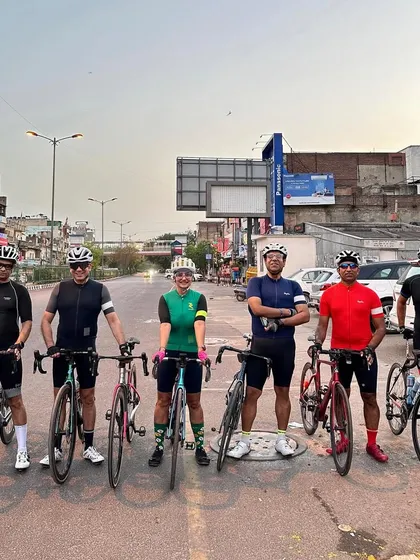 The group lines up for a photo on World Bicycle Day, promoting a healthier and more sustainable way of life.