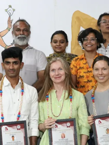 A group of students who have completed their 200 and 500-hour TTCs, ready to take their practice to the next level.