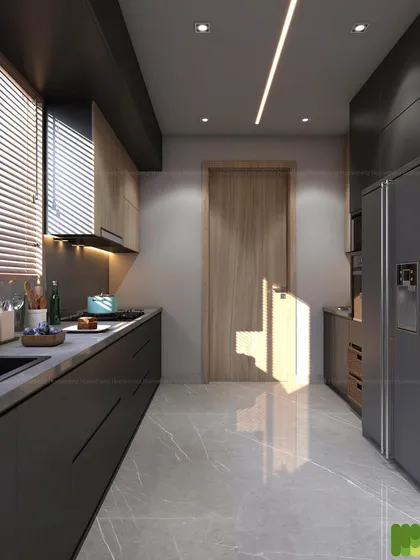 A sleek, modern galley kitchen. The handleless grey cabinets, marble-patterned floor, and linear ceiling light create a clean, minimalist, and functional workspace.
