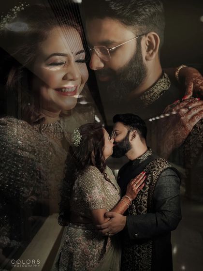 A dark and moody double exposure capturing a kiss and an intimate portrait.