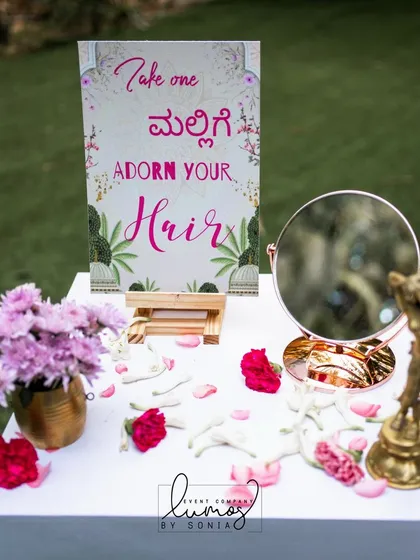 A closer view of the jasmine flower station, with a mirror and traditional brass elements.