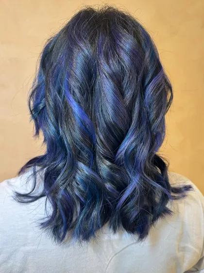 This is my Midnight Blue Rose vibe. I created a multi-tonal look with deep sapphire and violet hues melting together for a galaxy-inspired effect. This is a bleach color, perfect for anyone wanting to make a statement.