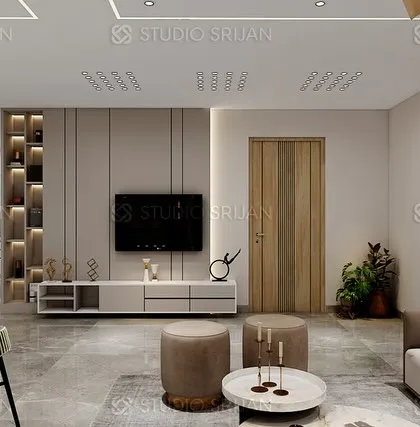 The open-plan design connects the living room to a modern kitchen with a breakfast bar, making the entire area feel social and integrated.