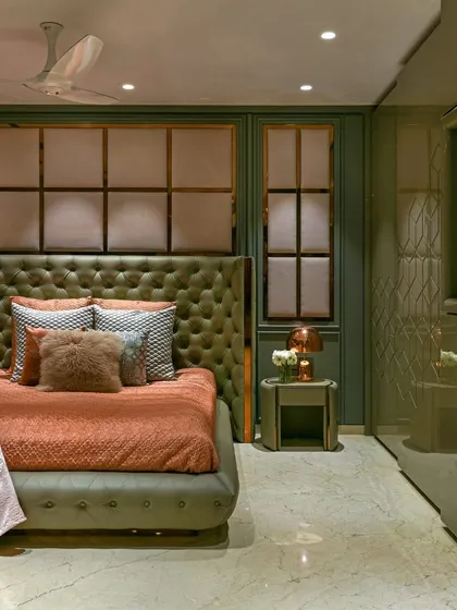 This angle highlights the glossy finish of the wardrobe and the intricate details of the wall paneling, showcasing our commitment to high-quality craftsmanship.