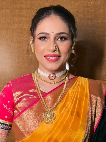 A beautiful portrait of my bride, her makeup perfectly complementing her traditional yellow saree.