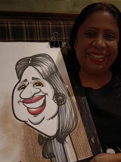 A beautiful smile captured in a caricature for Mother's Day at Mr. Merchant.