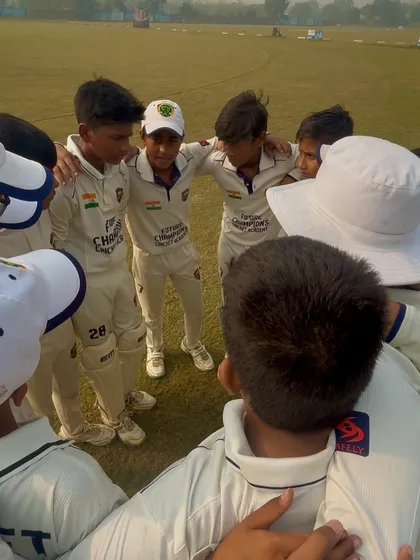 The team huddle, planning their strategy for the chase.