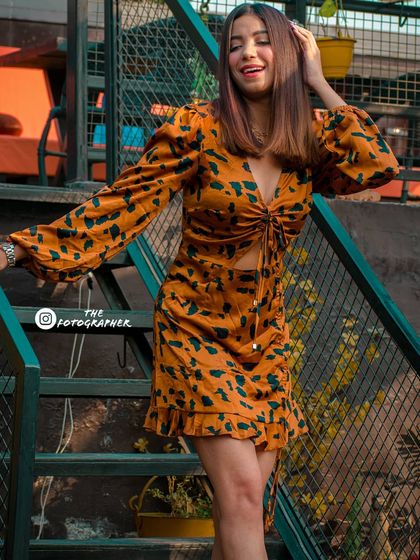 A full-body shot that captures a joyful, spontaneous moment. I encourage movement and expression to get lively photos.