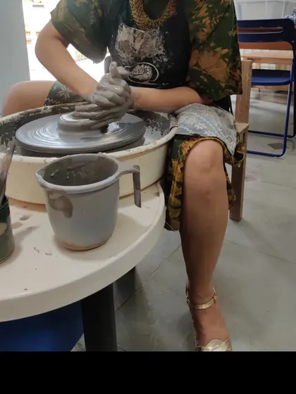 Who says you can't get your hands dirty and still be fabulous? A guest proves you can absolutely have time for a spin on the pottery wheel before heading out for a fun lunch with the girls.