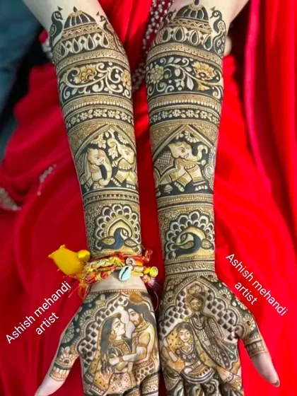 A stunning design featuring portraits of a couple on the palms, surrounded by traditional peacock and elephant motifs.