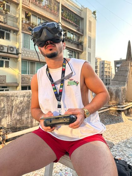 Geared up with my FPV goggles on a city rooftop. These are the moments when I feel weightless, not just in the air, but in my soul.