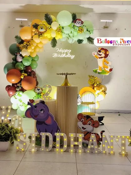 A clear, centered shot of the 'Two-Siddhant' jungle party decoration.