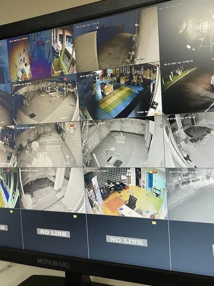 This is the view from a central monitoring station we set up for a client. We ensure you can see all critical areas of your business on a single screen, with clear night vision feeds for 24/7 security.