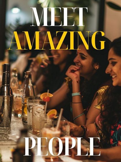 These workshops are a great way to meet amazing people. A group of guests are seen laughing and socializing while learning the art of cocktail making.