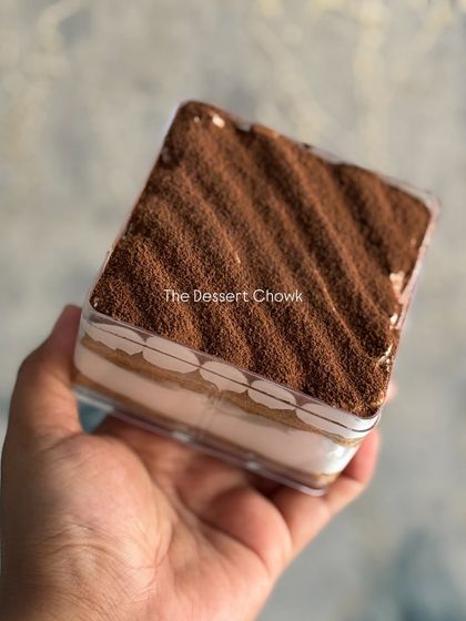 Holding my 300gms Tiramisu tub. It's the perfect size for a personal indulgence or for sharing with someone special.