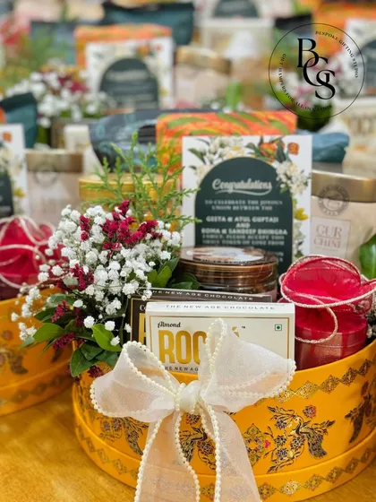This vibrant yellow hamper was designed for a Roka ceremony. It’s filled with celebratory items and congratulations card, making it a perfect gift to celebrate the beginning of a new journey together.