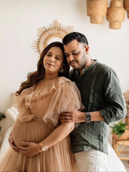 A peaceful, quiet moment between the parents-to-be. Their closed eyes and gentle embrace make this such an emotional and heartfelt portrait.