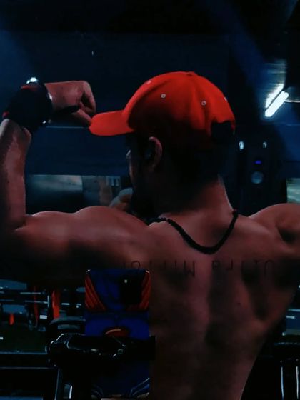 An aesthetic back pose. My coaching emphasizes symmetry and definition across the entire back, from the traps down to the lower lats.