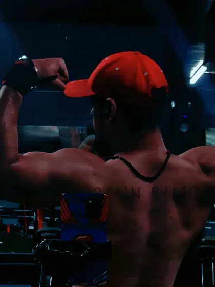 An aesthetic back pose. My coaching emphasizes symmetry and definition across the entire back, from the traps down to the lower lats.