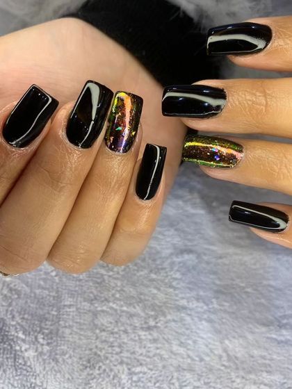 Another angle of the black and chrome set, showing how the light catches the holographic effect.