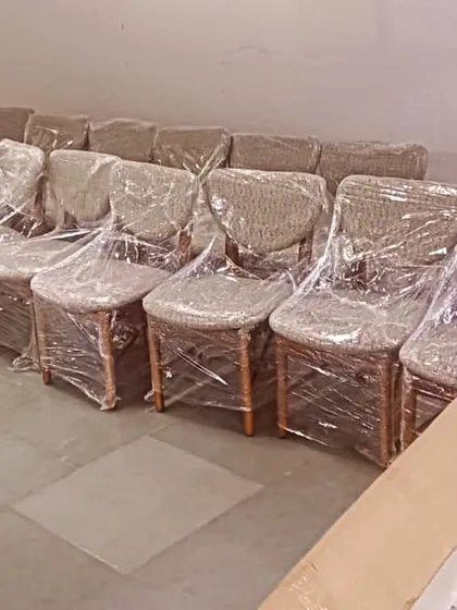 A batch of our dining chairs, wrapped and ready for delivery to a restaurant client in Chembur, Mumbai. We can handle bulk orders for commercial projects.